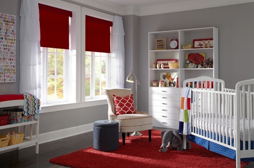 Red-Roman-shades-and-rug-in-the-nursery-keep-the-space-elegant-simple-and-lively